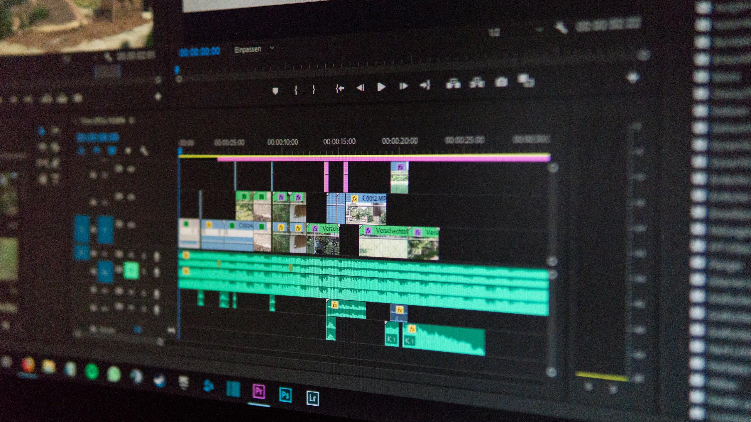 Close-up of a video editing timeline interface on a computer screen, showcasing professional software in action.